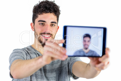 Casual man taking a selfie