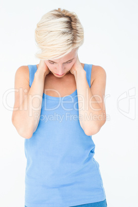 Woman suffering from neck pain