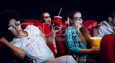 Young friends watching a 3d film