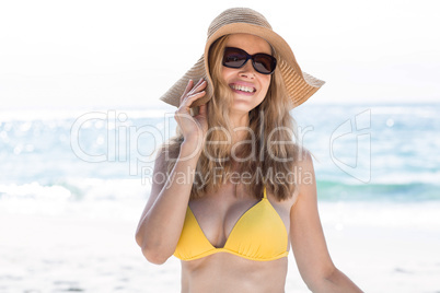 Smiling pretty blonde wearing sun glasses