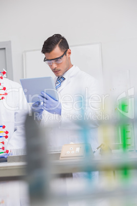 Scientist using tablet pc