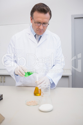 Scientist mixing precipitates