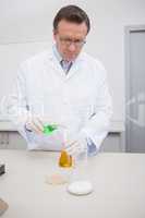 Scientist mixing precipitates