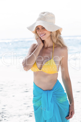 Smiling pretty blonde in bikini