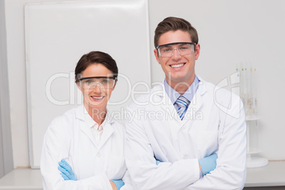 Scientists smiling and looking at camera