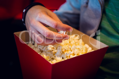 Man eating popcorn