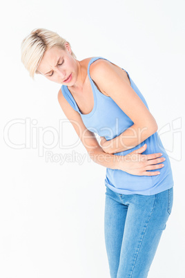 Casual woman with stomach pain