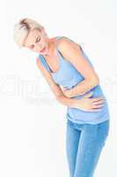 Casual woman with stomach pain