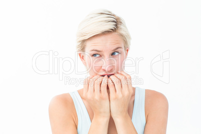Nervous woman biting her nails