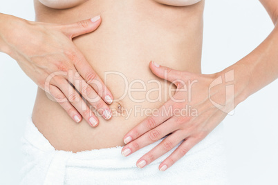 Beautiful woman touching her belly