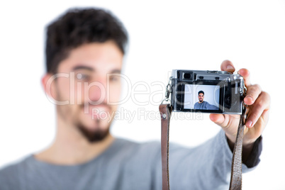 Casual man taking a selfie