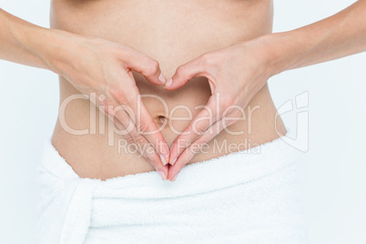 Attractive woman touching her belly