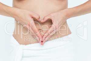 Attractive woman touching her belly