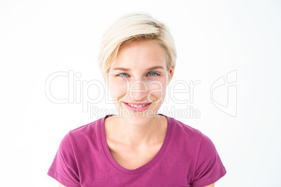 Pretty blonde woman smiling at camera