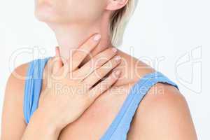 Blonde woman suffering from throat pain