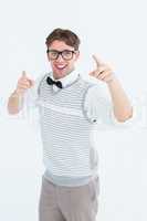 Geeky hipster in sweater vest dancing