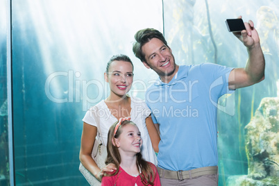 Happy family taking a selfie