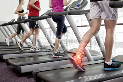 Highlighted ankle of man on treadmill