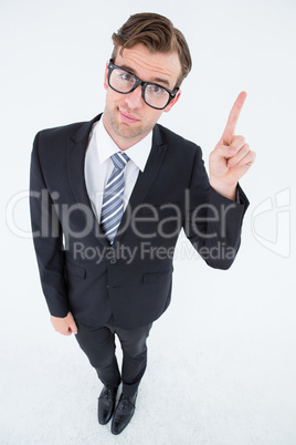 Geeky hipster businessman with finger up