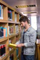 Student reading in library