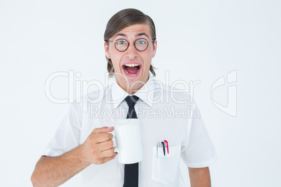 Geeky businessman holding a mug