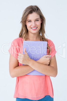 Pretty hipster holding notepad