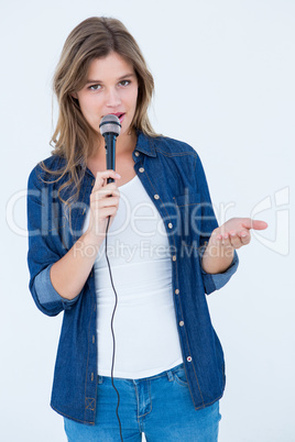 Woman singing with a microphone