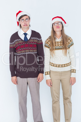 Sad geeky hipster couple