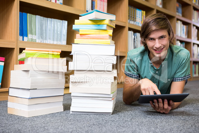 Student lying on library floor