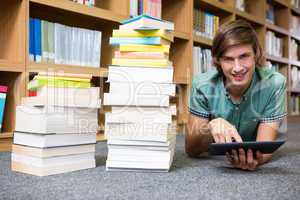 Student lying on library floor