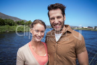 Happy couple at a lake