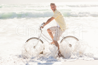 Happy man on a bike ride