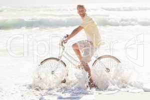 Happy man on a bike ride