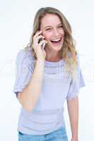 Smiling woman calling with her smartphone