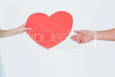Woman giving heart card to her boyfriend