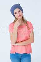 Hipster woman with hat looking at camera
