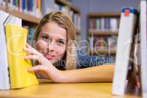 Pretty student in the library