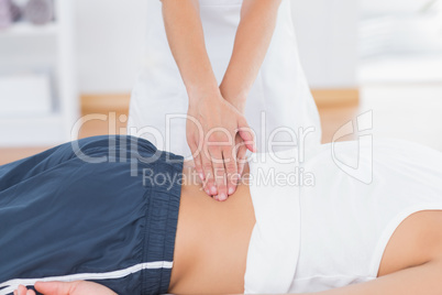 Physiotherapist doing back massage