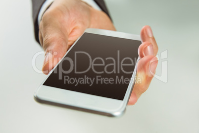 Businessman using his smart phone Businessman using his smart phone