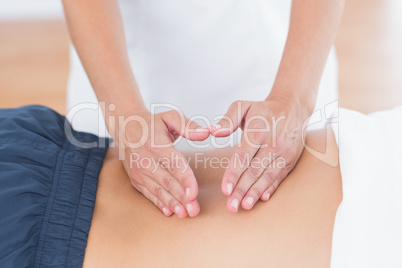 Physiotherapist doing back massage