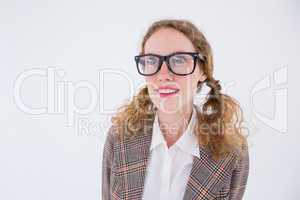 smiling  geeky hipster girl looking at something
