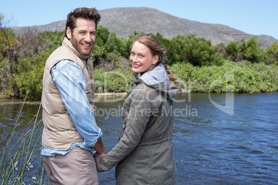 Happy couple at a lake