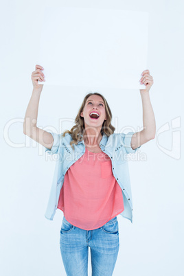 Woman holding poster
