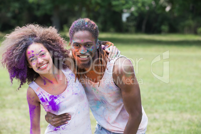 Hipsters covered in powder paint