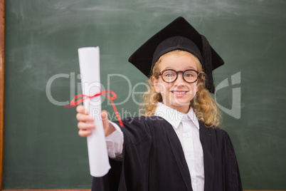 Pupil with graduation robe and holding her diploma
