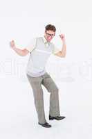 Geeky hipster dancing and smiling