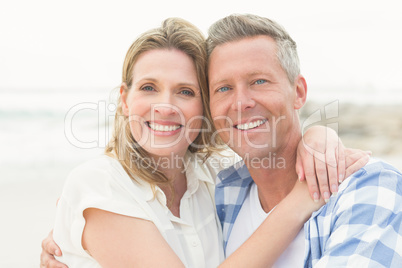 Casual couple smiling at camera