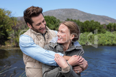 Happy couple at a lake