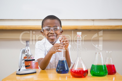 Cute pupil looking at liquids