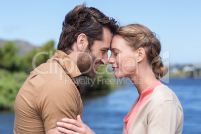 Happy couple at a lake